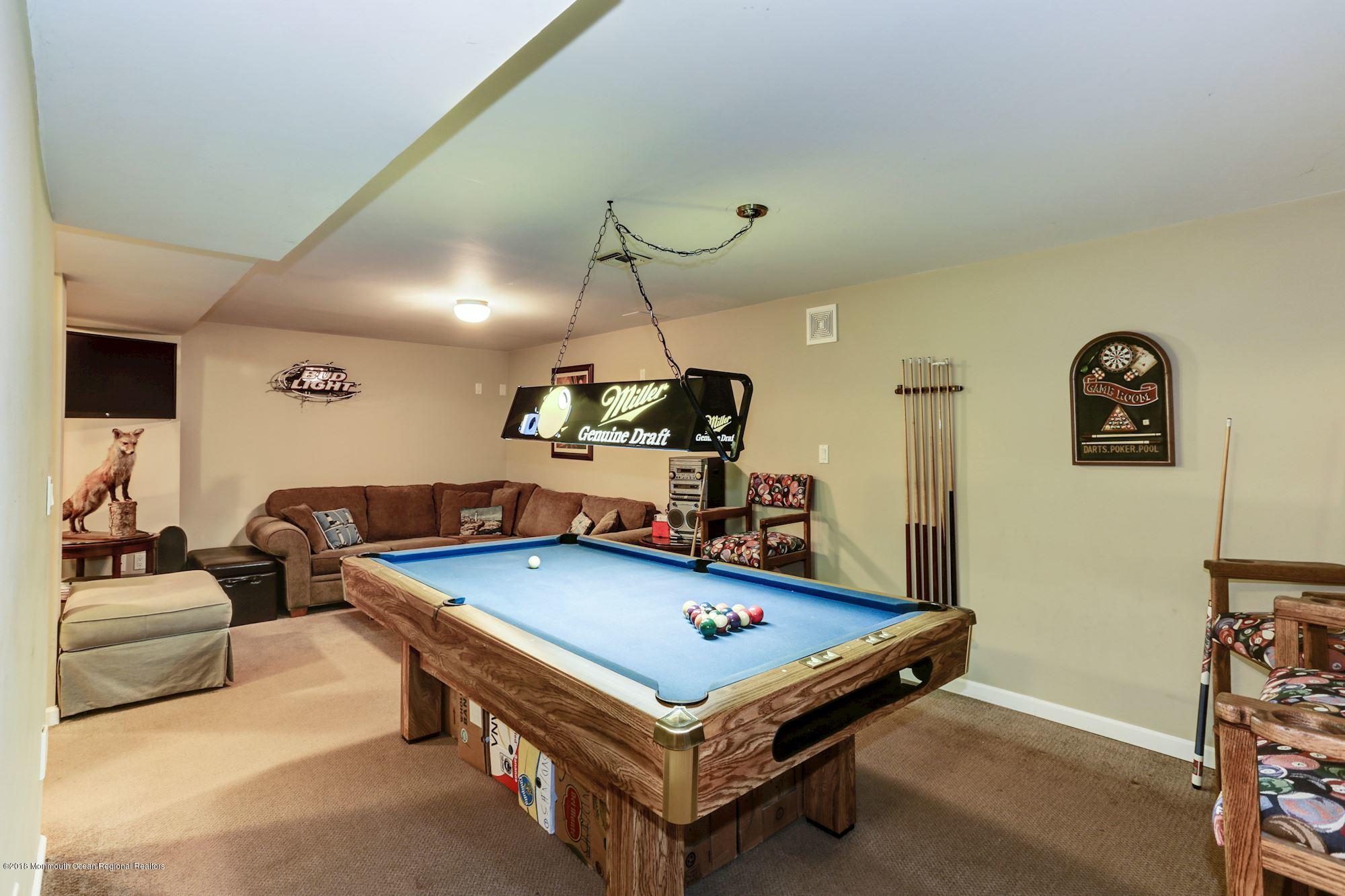 132 Brandon Road Manchester Township, NJ 08759 - Photo 14 of 24 a room with furniture pool table and windows