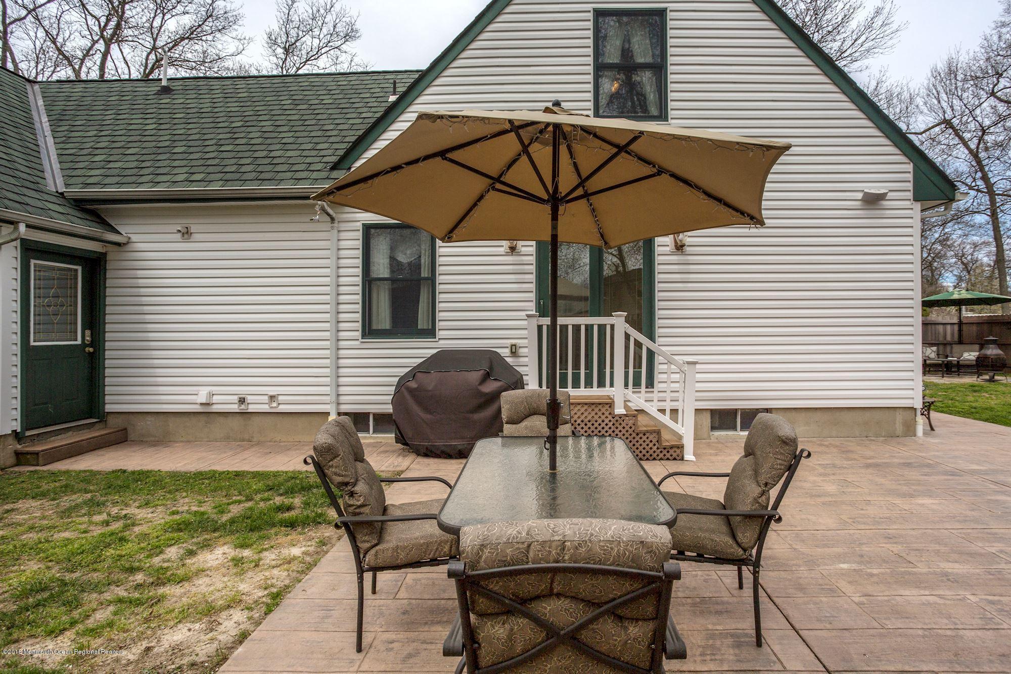 132 Brandon Road Manchester Township, NJ 08759 - Photo 21 of 24 a outdoor view with a sitting space