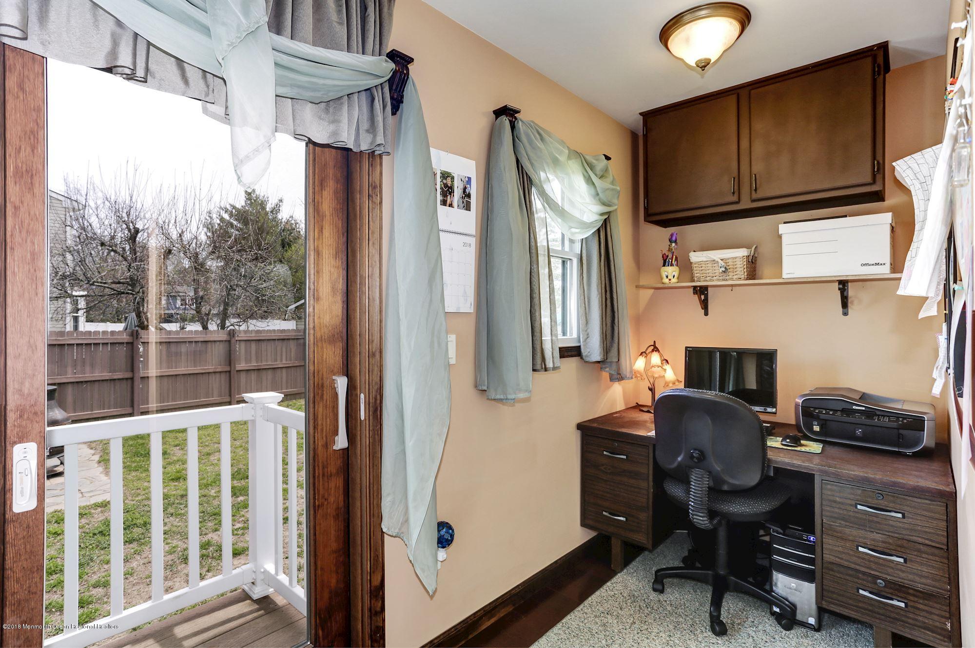 132 Brandon Road Manchester Township, NJ 08759 - Photo 6 of 24 a view of a workspace with furniture and a window
