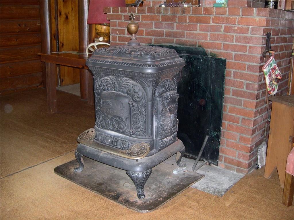 279 Dodge Pond Road, Unit 5 Rangeley, ME 04970 - Photo 7 of 35 parlor stove close-up
