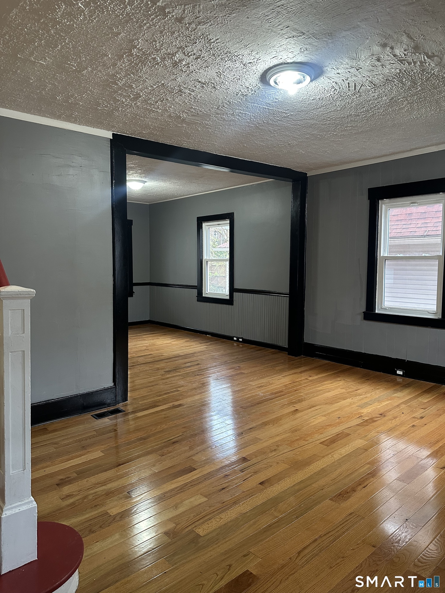 302 Dover Street Bridgeport, CT 06610 - Photo 2 of 40 a view of empty room with wooden floor