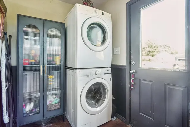 a utility room with dryer and washer