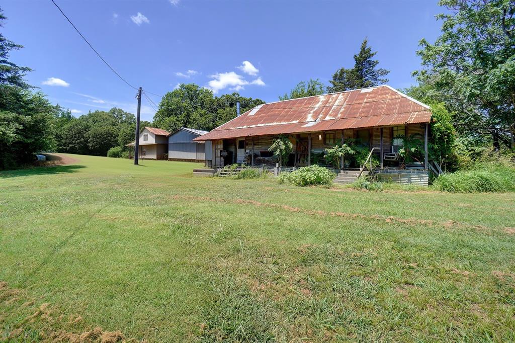 2454 Decatur Tx 76234 Decatur, TX 76234 - Photo 24 of 35 a backyard of a house with yard barbeque oven and outdoor seating