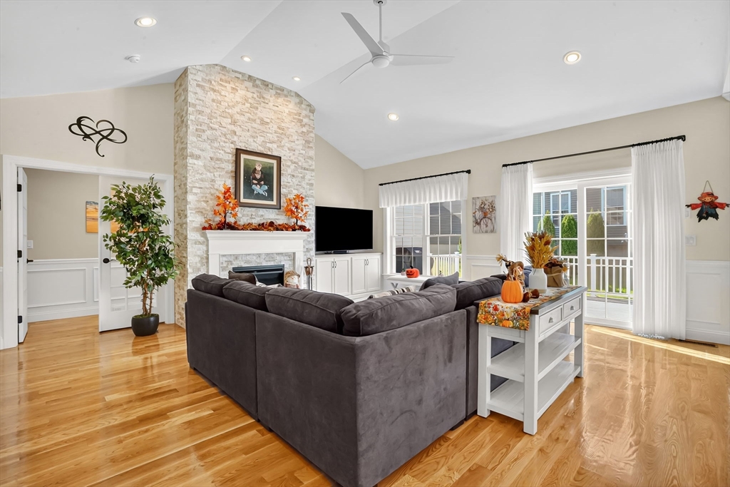 48 Liberty Lane Enfield, CT 06082 - Photo 21 of 32 a living room with furniture and a flat screen tv