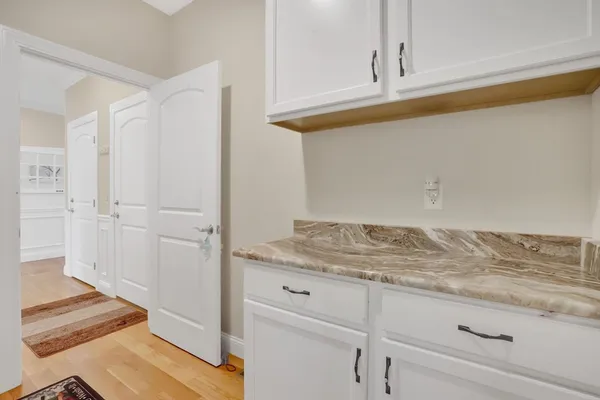a bathroom with a sink and vanity