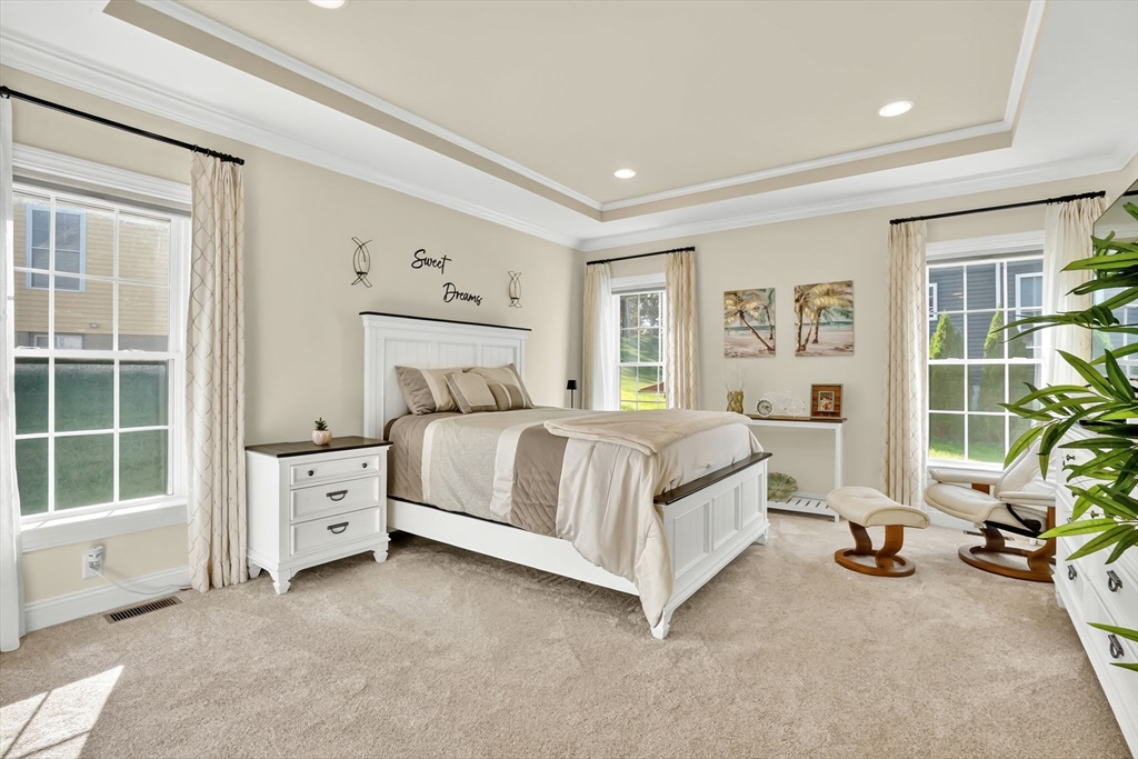 48 Liberty Lane Enfield, CT 06082 - Photo 26 of 32 a bedroom with a bed and a window
