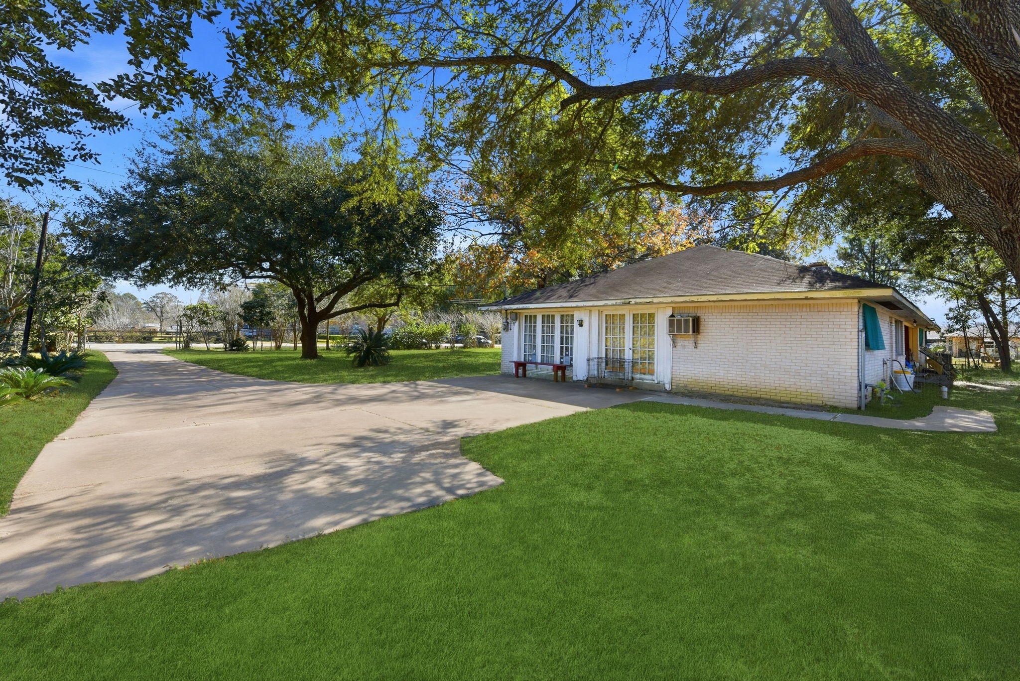 11902 Dover Street Houston, TX 77031 - Photo 12 of 29 a view of a house with backyard and a tree