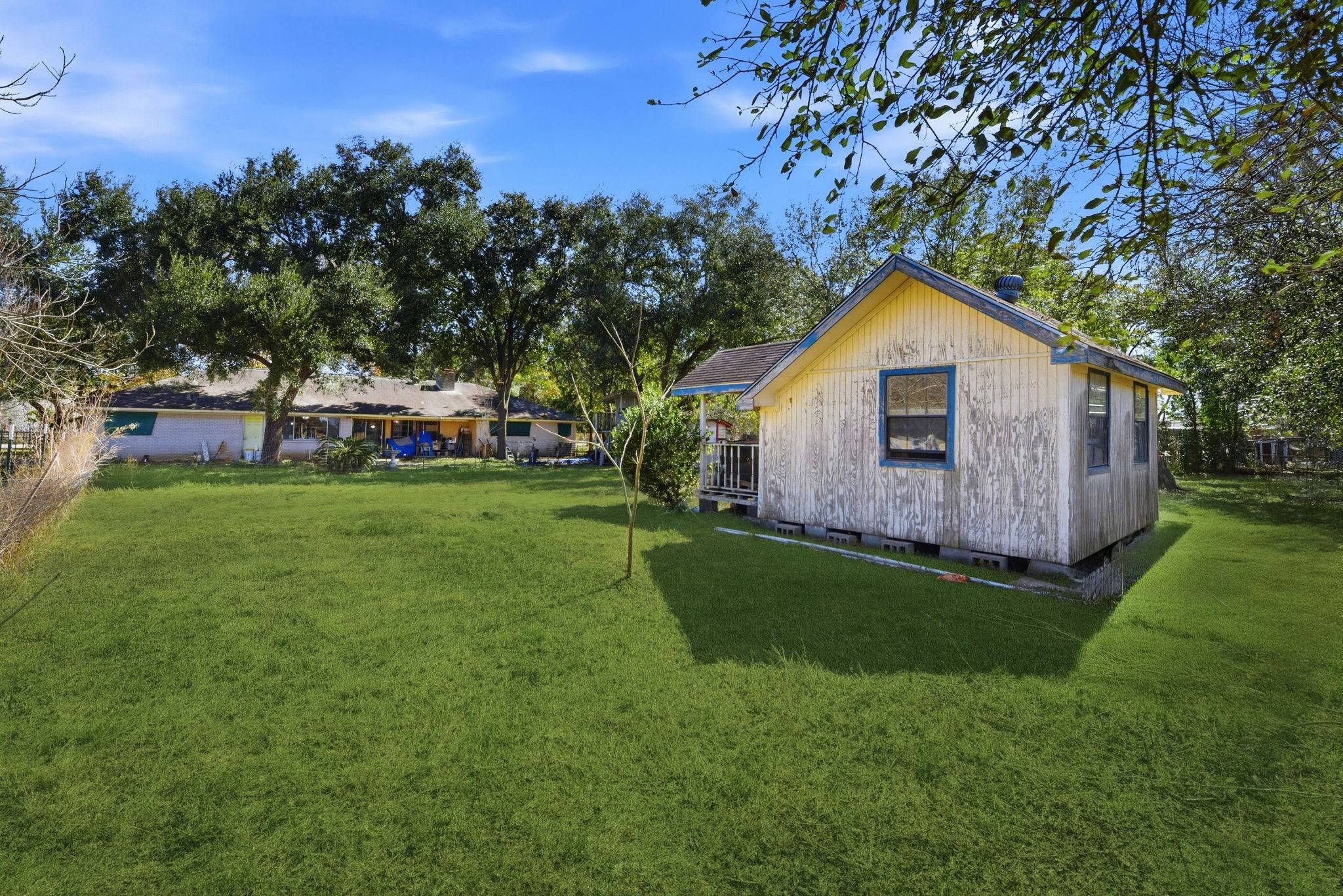 11902 Dover Street Houston, TX 77031 - Photo 20 of 29 a view of an house with backyard space and garden