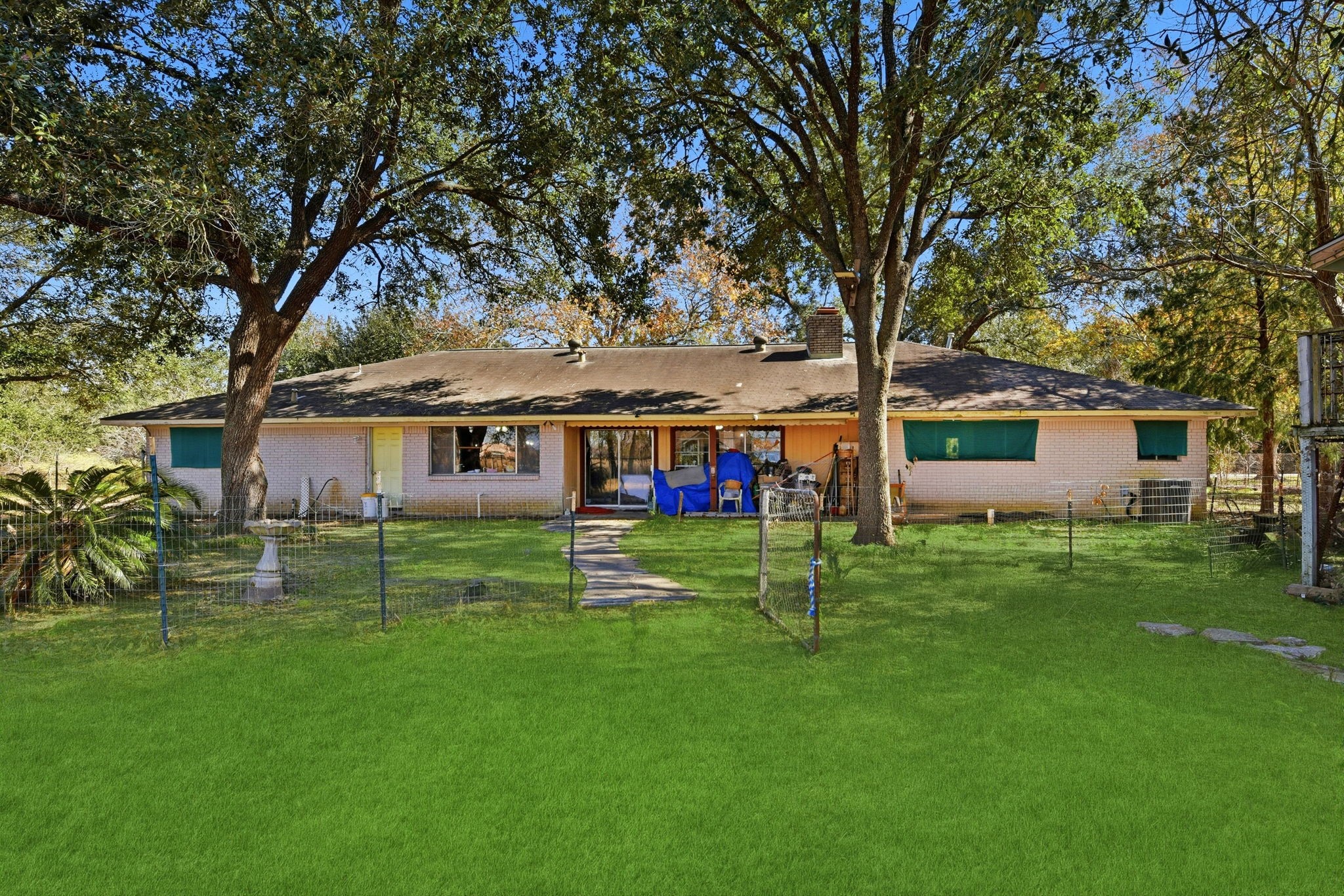 11902 Dover Street Houston, TX 77031 - Photo 24 of 29 a view of an house with backyard and a tree
