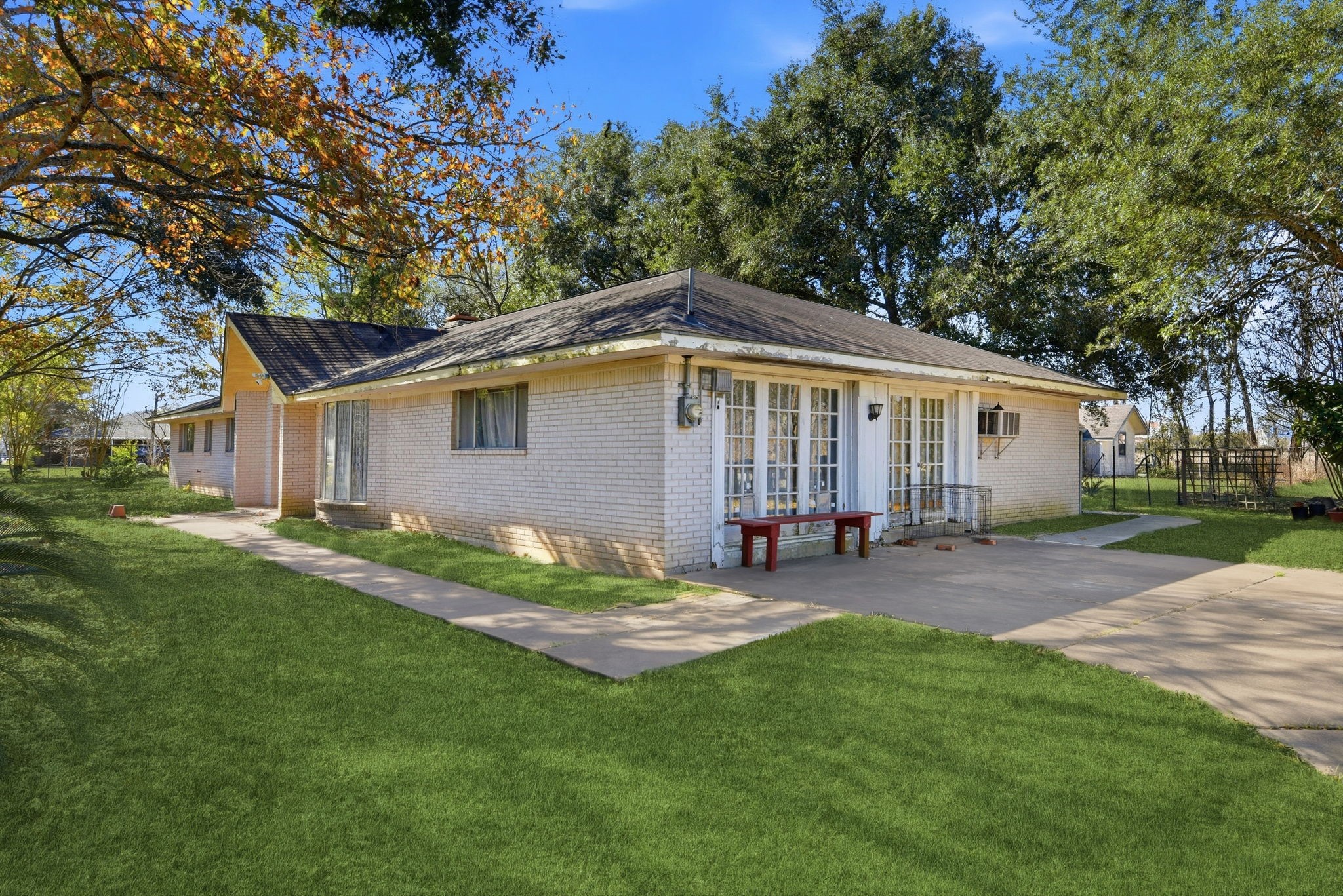 11902 Dover Street Houston, TX 77031 - Photo 8 of 29 a view of a house with a yard and sitting area