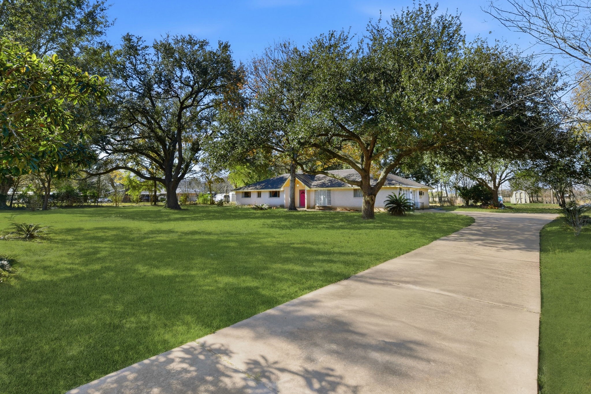 11902 Dover Street Houston, TX 77031 - Photo 9 of 29 a view of grassy field with benches