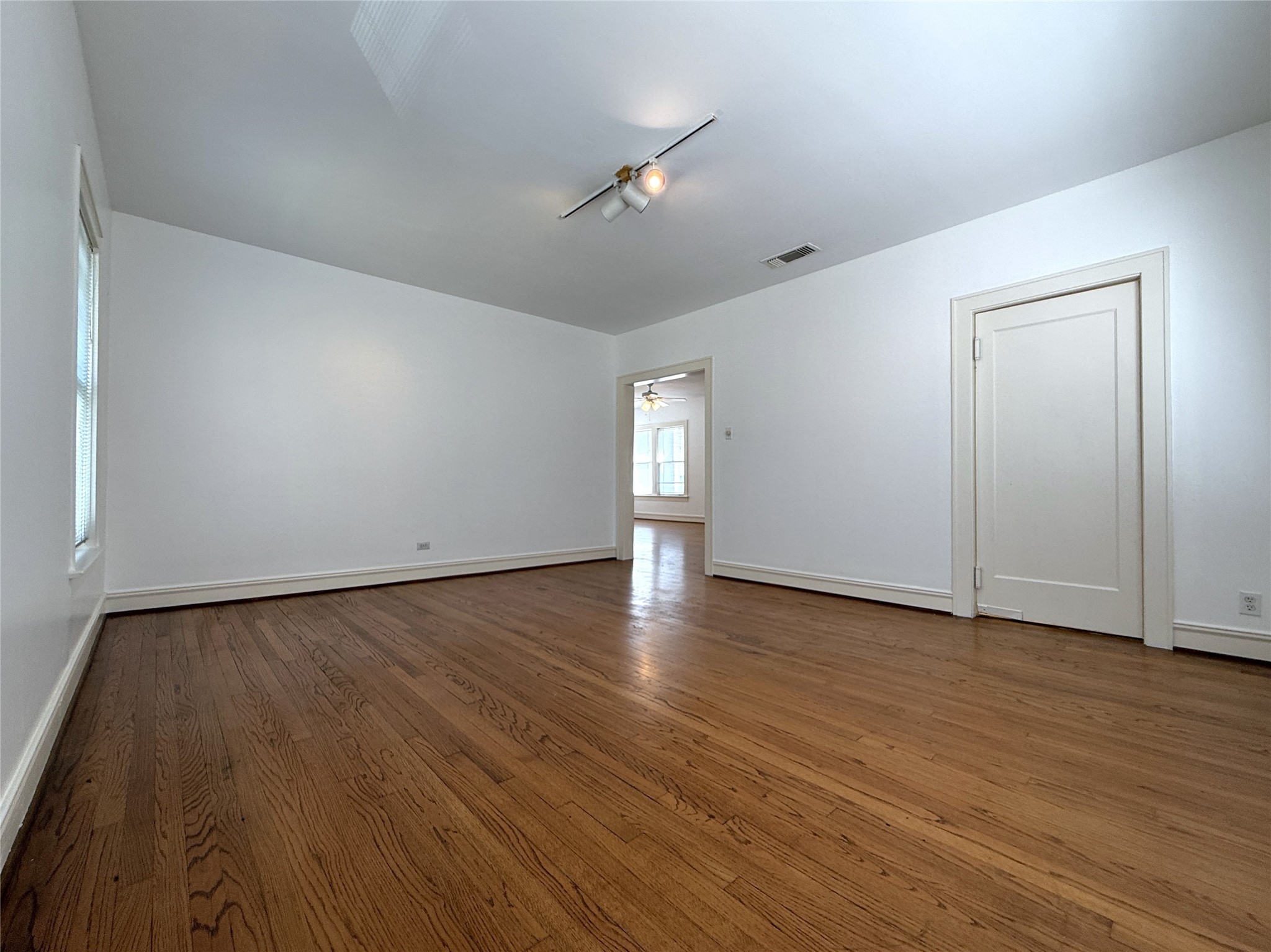 2311 Wroxton Road Houston, TX 77005 - Photo 9 of 24 Alternate view of the dining room. Beyond the swinging door is the kitchen.