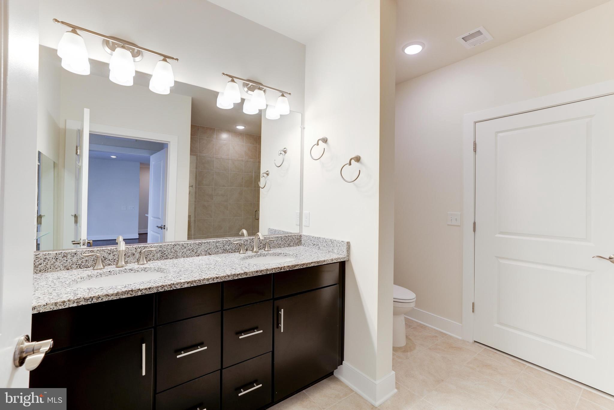 11200 Reston Station Boulevard, Unit 502 Reston, VA 20190 - Photo 10 of 40 Granite countertops