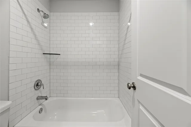 a bathroom with a bathtub