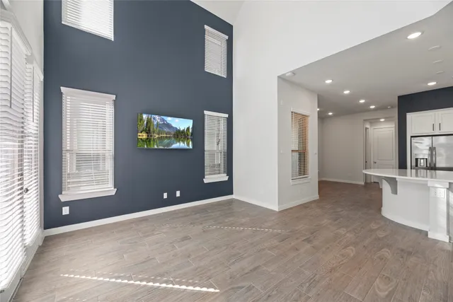 a view of a kitchen with a sink and a window