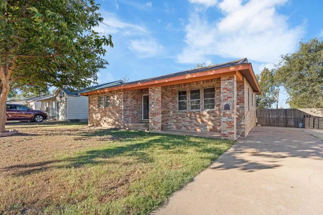 a view of a house with a patio