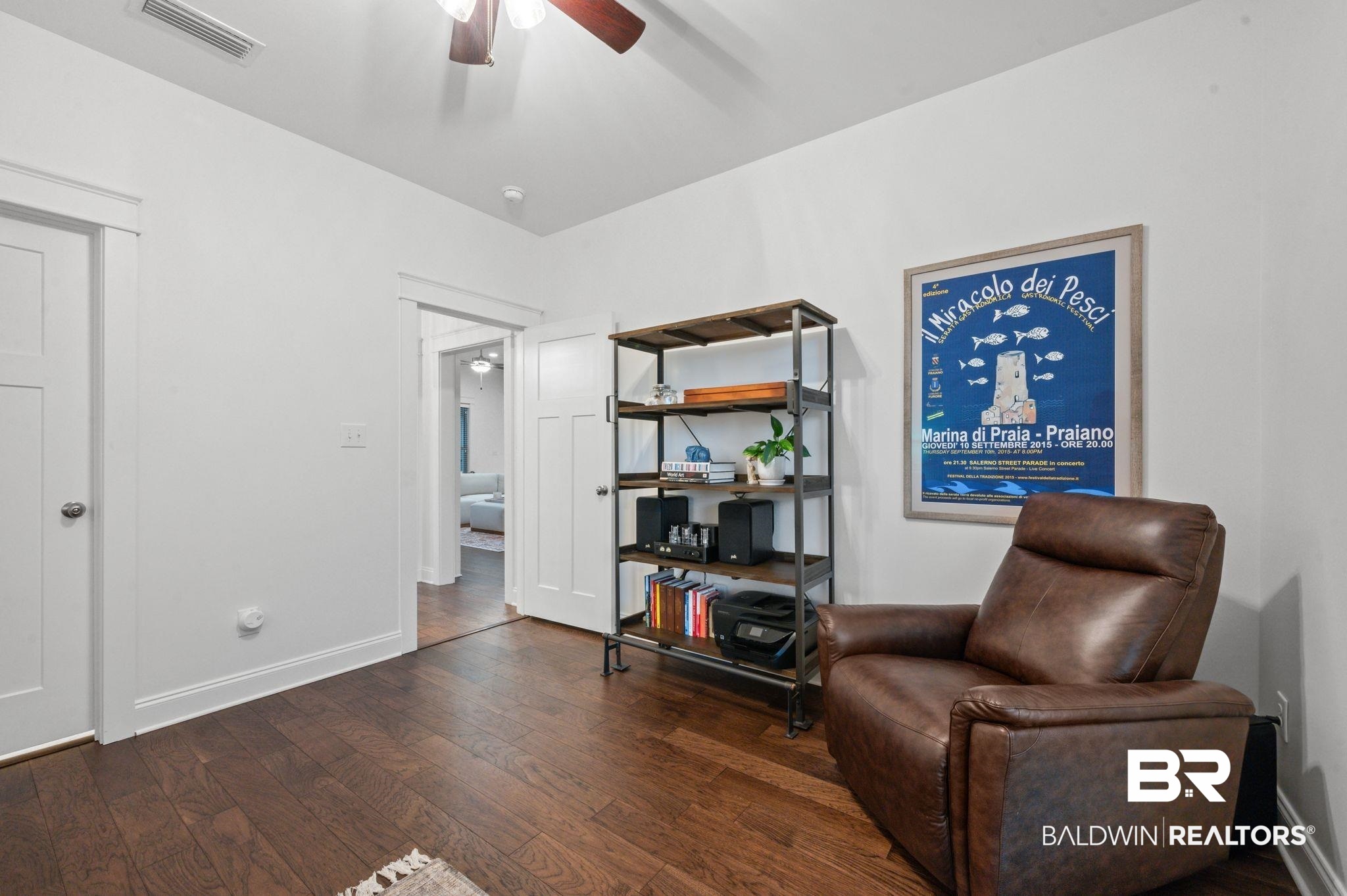 418 Fortune Drive Fairhope, AL 36532 - Photo 41 of 63 Sitting room with dark wood-type flooring and ceiling fan