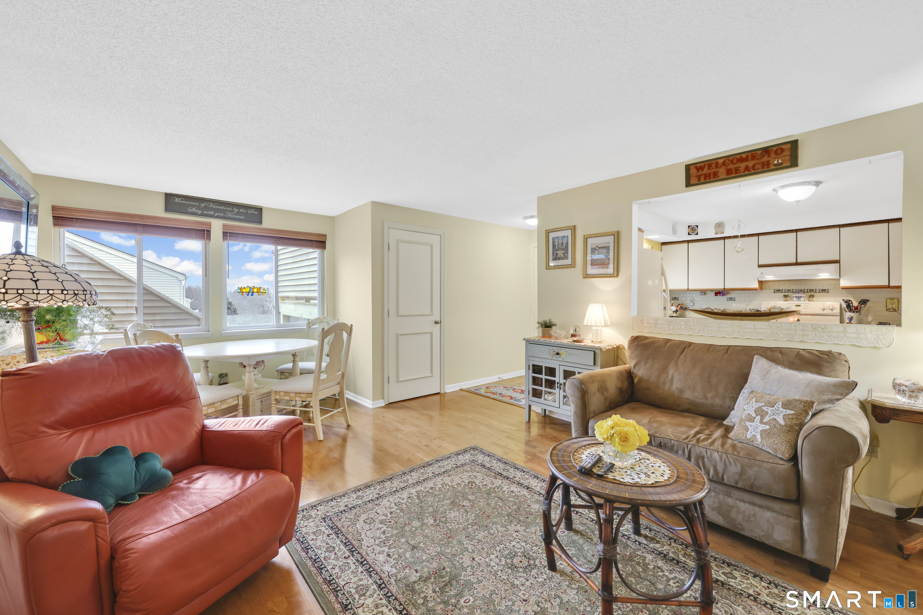 260 Brittany Farms Road, Unit B New Britain, CT 06053 - Photo 11 of 34 a living room with furniture and a large window