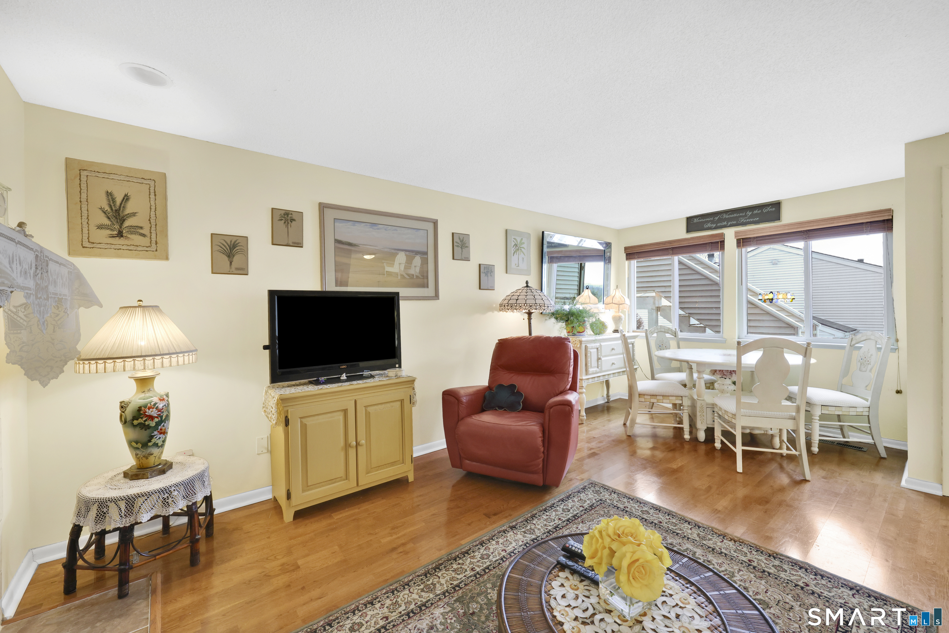 260 Brittany Farms Road, Unit B New Britain, CT 06053 - Photo 12 of 34 a living room with furniture and a flat screen tv