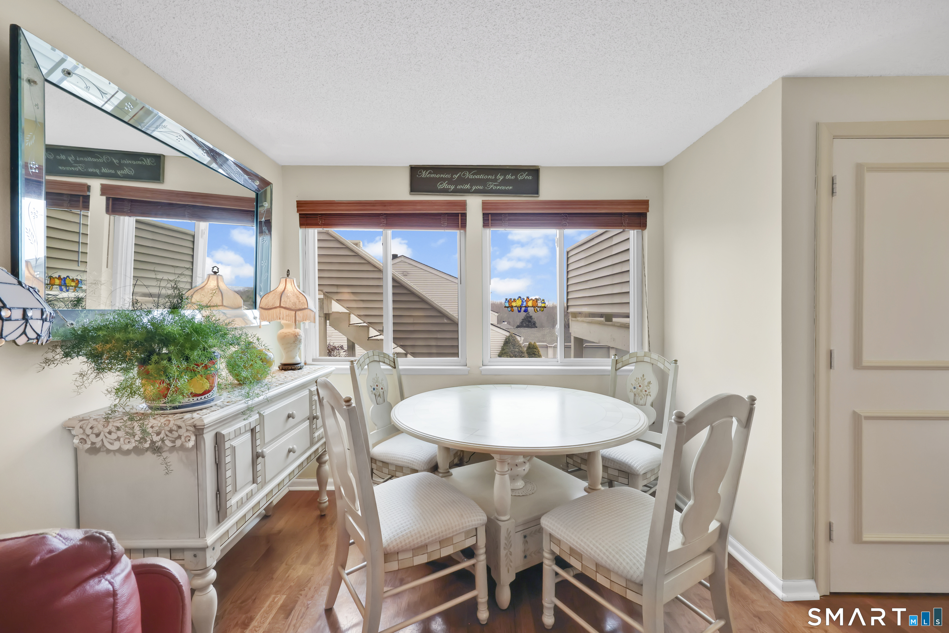 260 Brittany Farms Road, Unit B New Britain, CT 06053 - Photo 13 of 34 a dining room with furniture and window