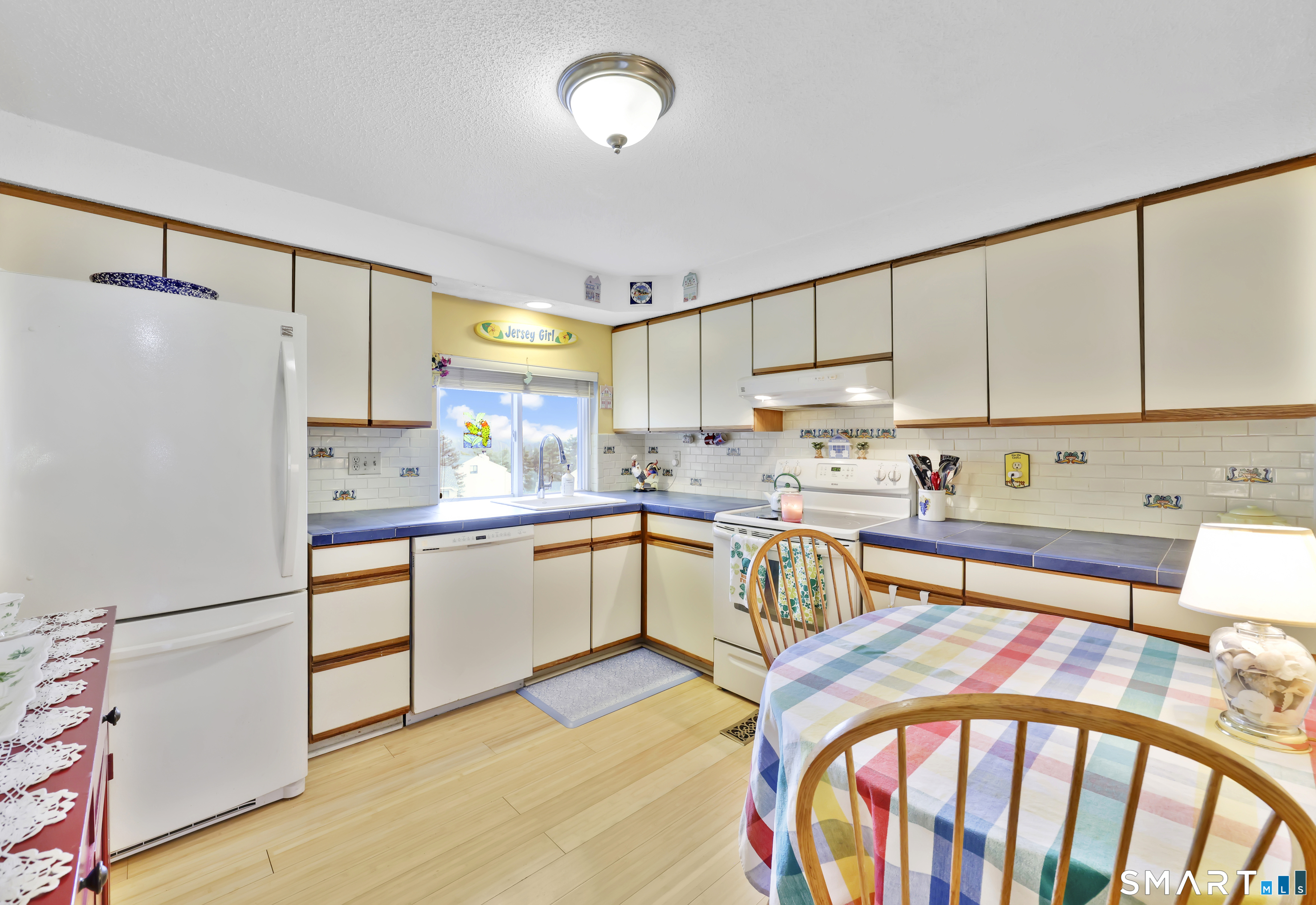 260 Brittany Farms Road, Unit B New Britain, CT 06053 - Photo 14 of 34 a kitchen with stainless steel appliances sink refrigerator and cabinets