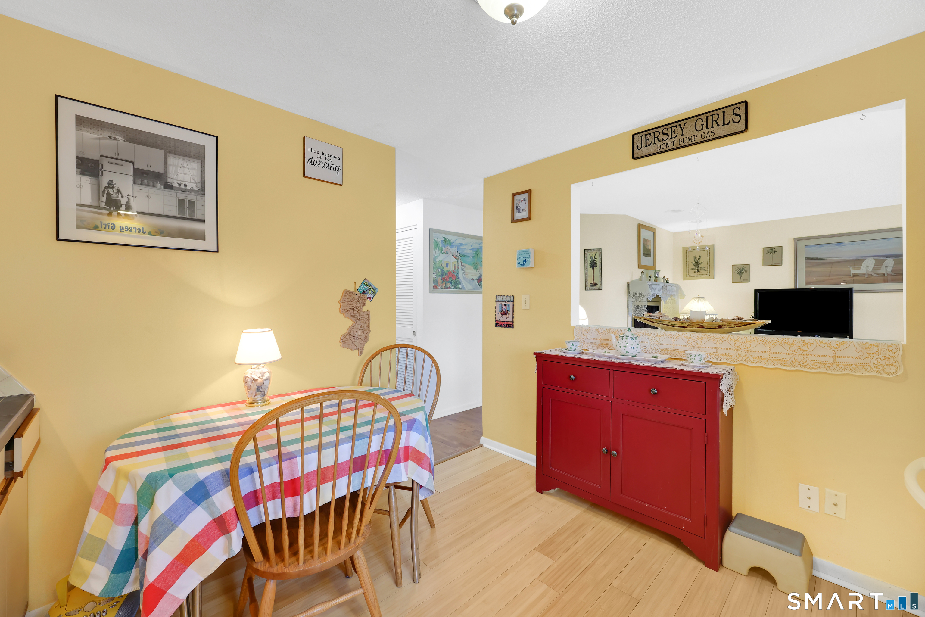 260 Brittany Farms Road, Unit B New Britain, CT 06053 - Photo 16 of 34 a bedroom with a bed and a flat screen tv