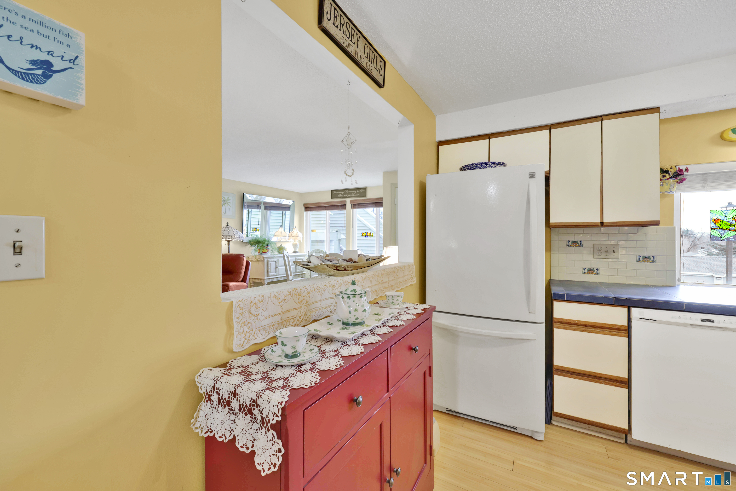 260 Brittany Farms Road, Unit B New Britain, CT 06053 - Photo 19 of 34 a kitchen with stainless steel appliances a refrigerator and a stove top oven