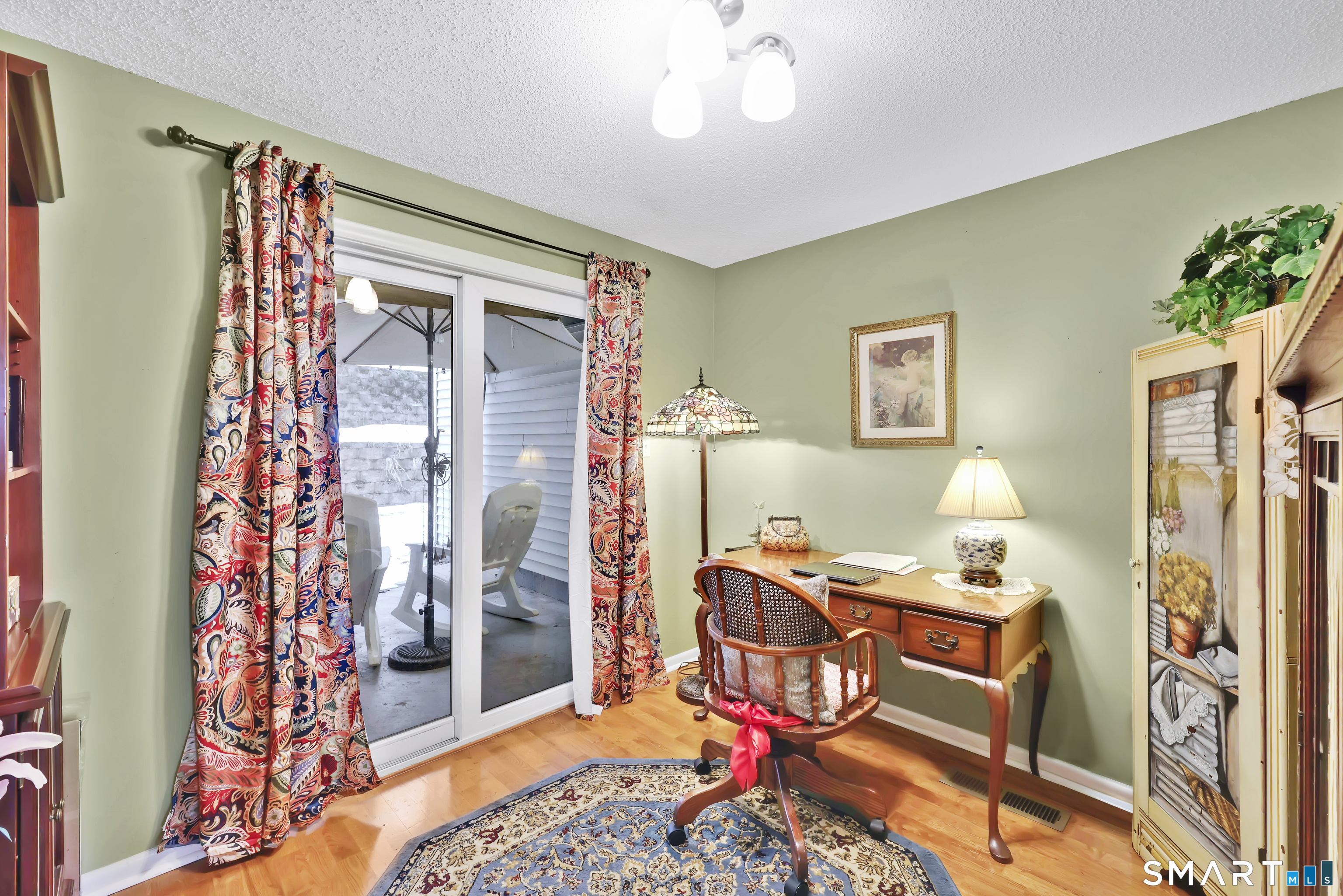 260 Brittany Farms Road, Unit B New Britain, CT 06053 - Photo 20 of 34 a workspace with furniture and a window