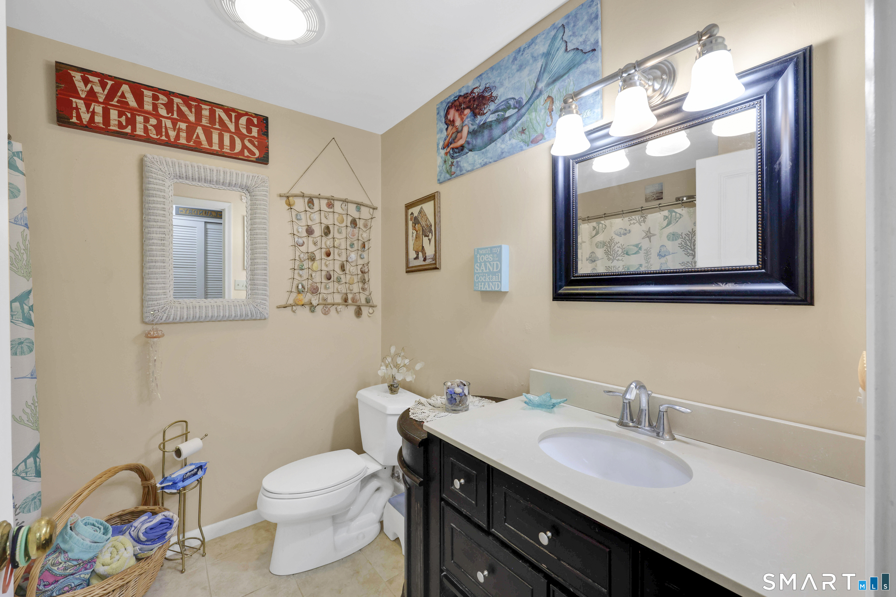 260 Brittany Farms Road, Unit B New Britain, CT 06053 - Photo 22 of 34 a bathroom with a granite countertop sink mirror vanity and toilet