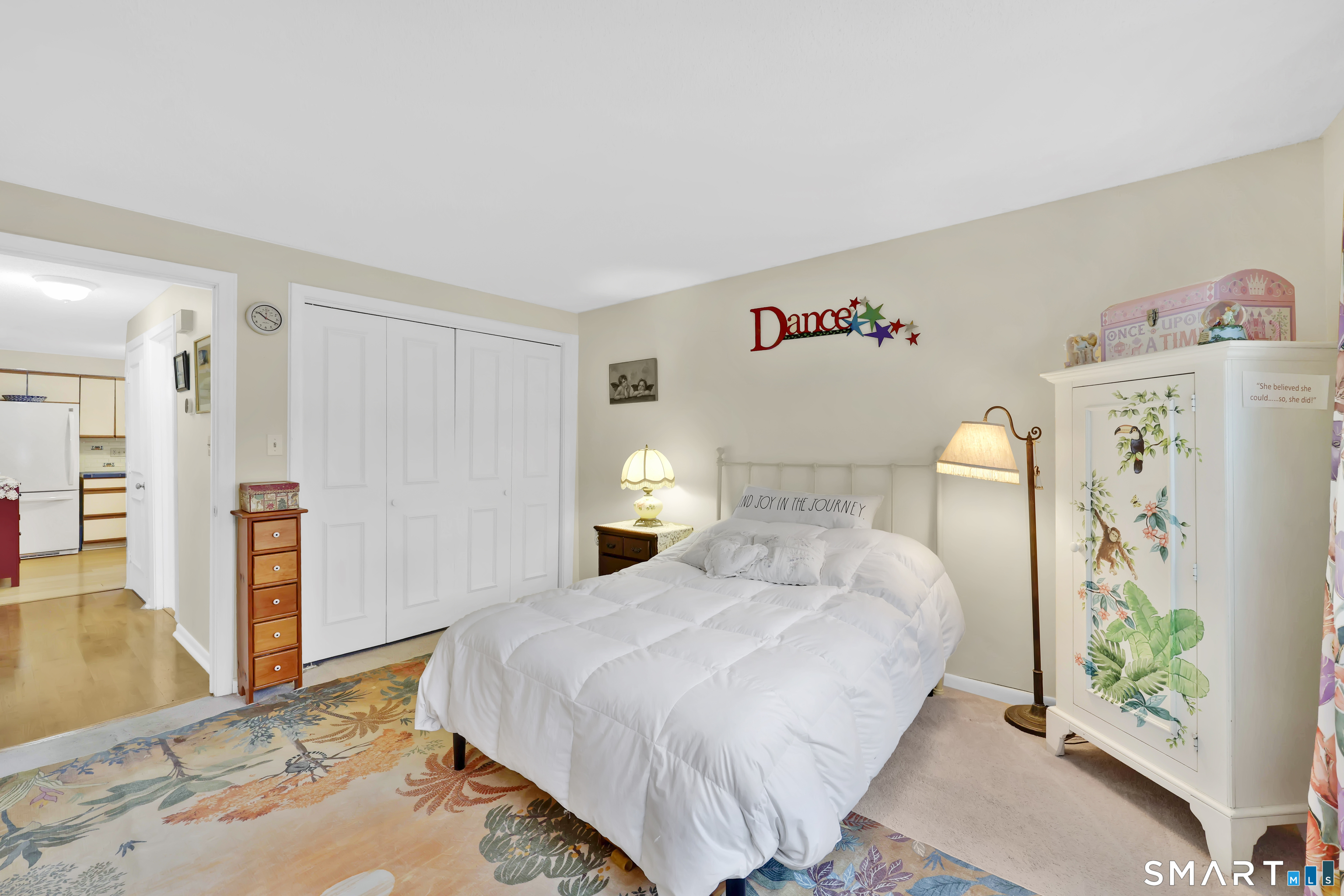 260 Brittany Farms Road, Unit B New Britain, CT 06053 - Photo 24 of 34 a bedroom with a bed and a table