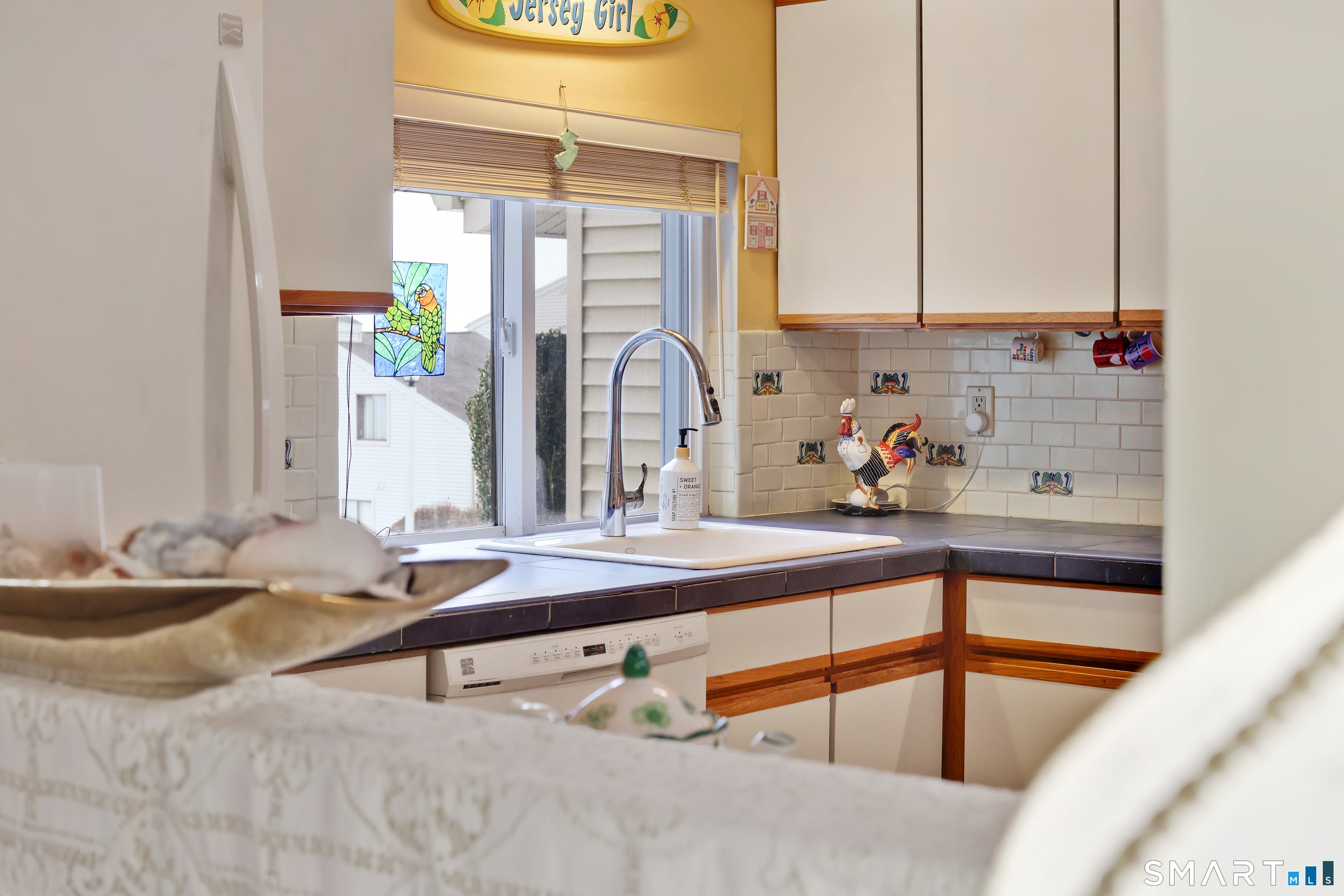 260 Brittany Farms Road, Unit B New Britain, CT 06053 - Photo 27 of 34 a kitchen with sink and window