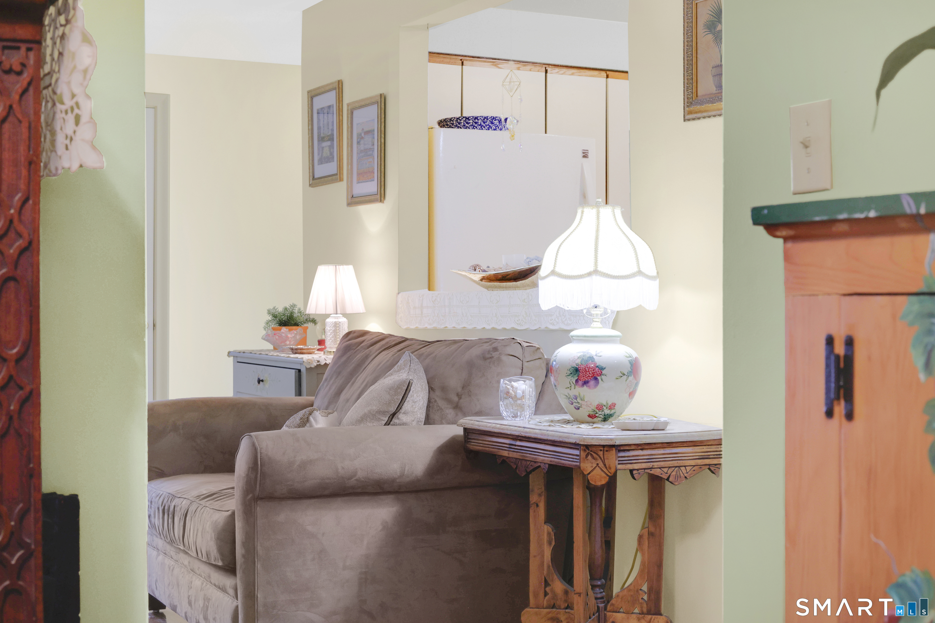 260 Brittany Farms Road, Unit B New Britain, CT 06053 - Photo 32 of 34 a living room with furniture and a window