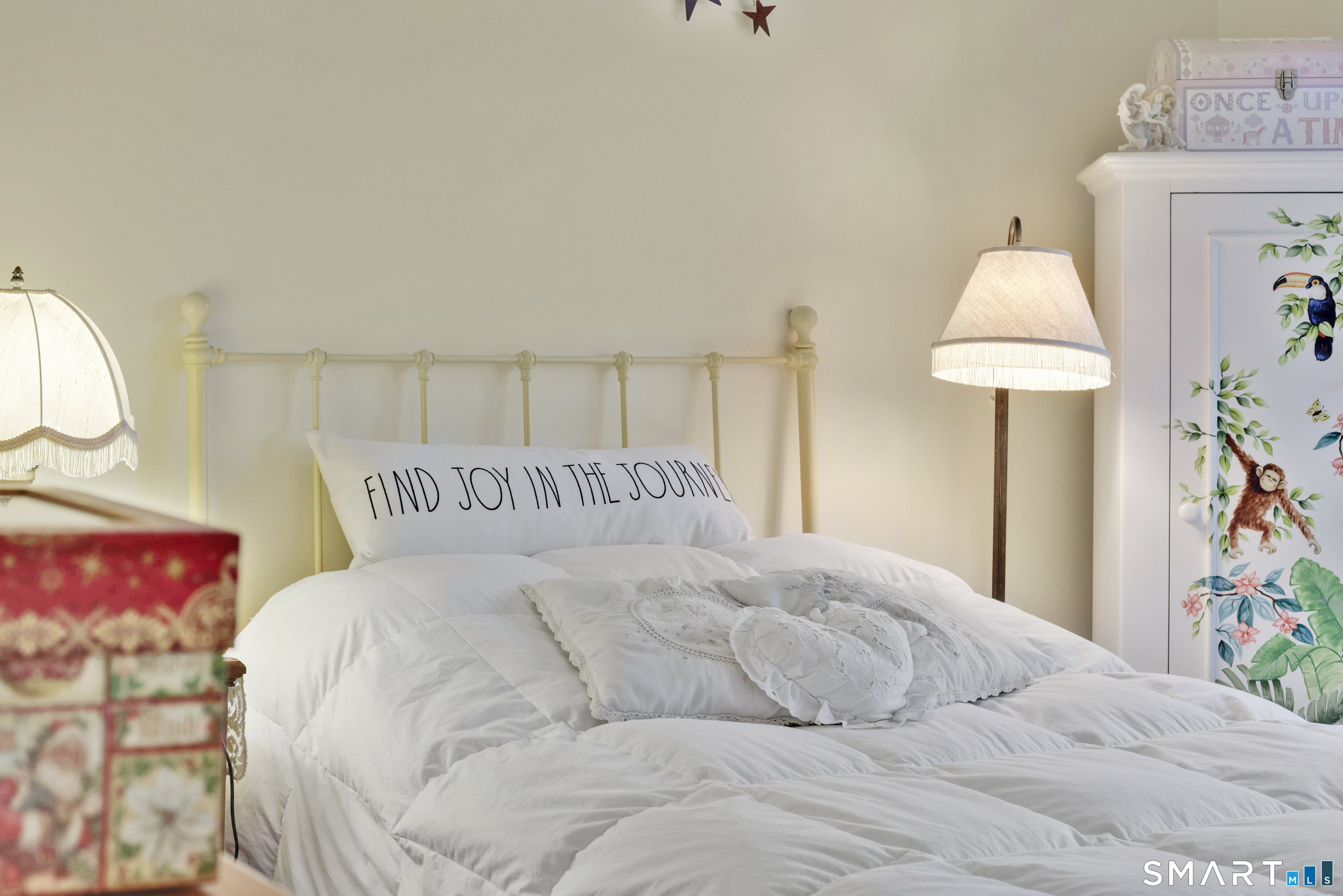 260 Brittany Farms Road, Unit B New Britain, CT 06053 - Photo 34 of 34 a bedroom with a bed and a lamp