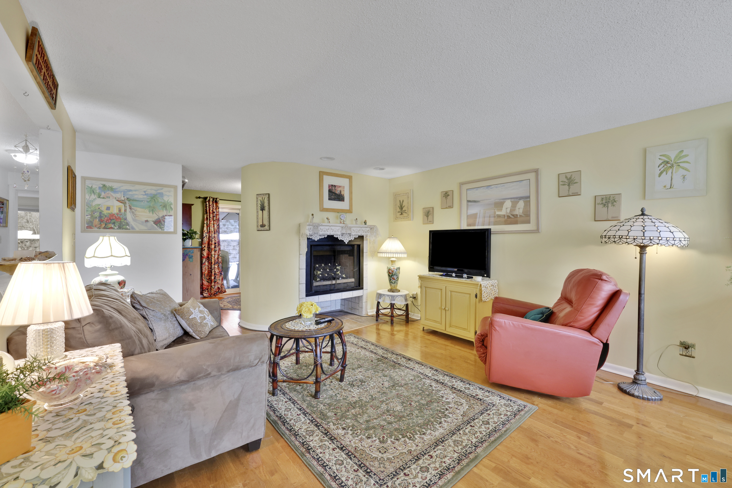 260 Brittany Farms Road, Unit B New Britain, CT 06053 - Photo 9 of 34 a living room with furniture and a flat screen tv