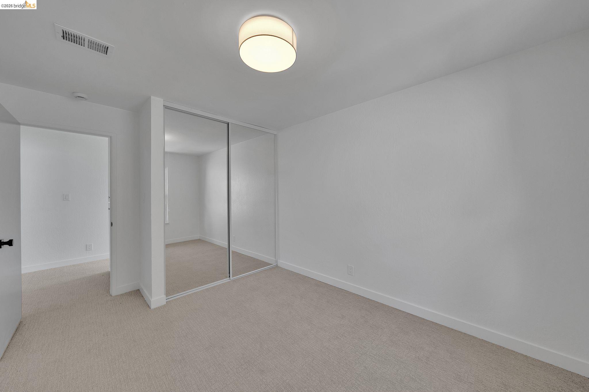 1808 Wildbrook Court, Unit D Concord, CA 94521 - Photo 25 of 47 a view of an empty room