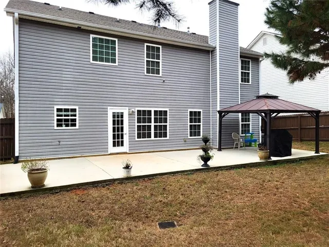 a view of a house with a patio
