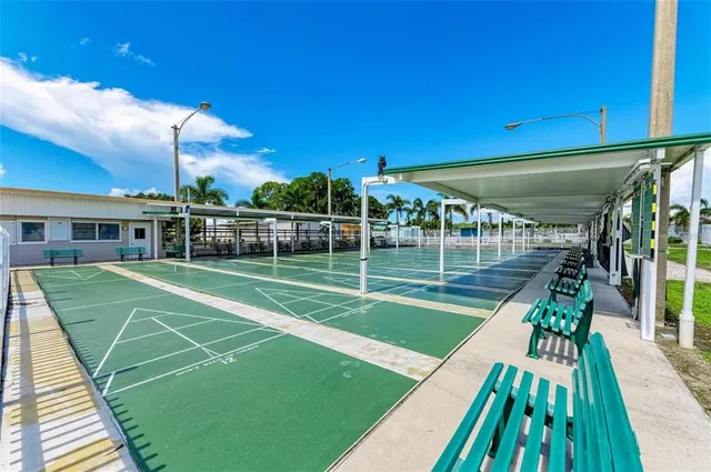 a view of a swimming pool with a patio
