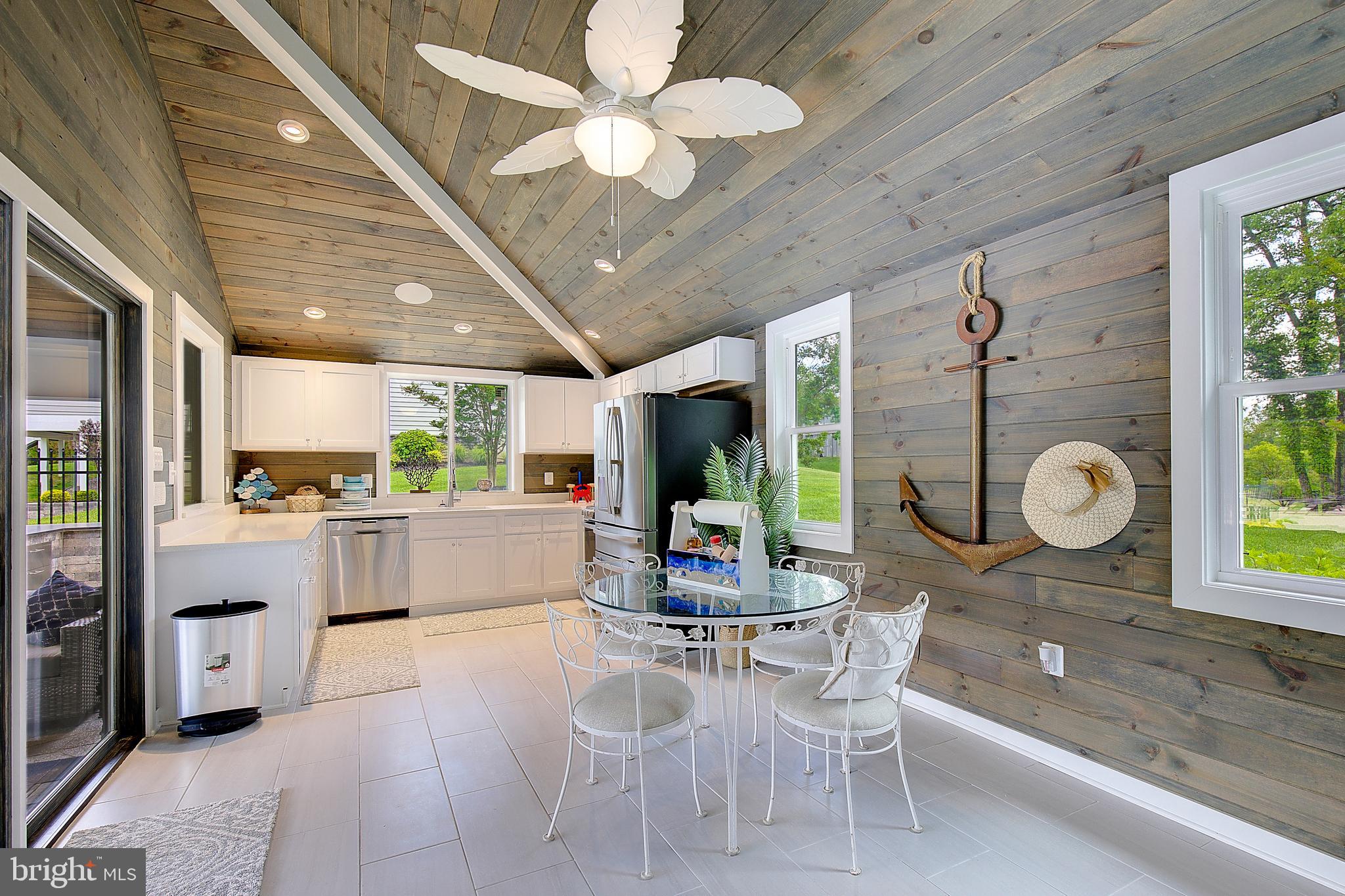 Stunning pool house with custom wood finishes