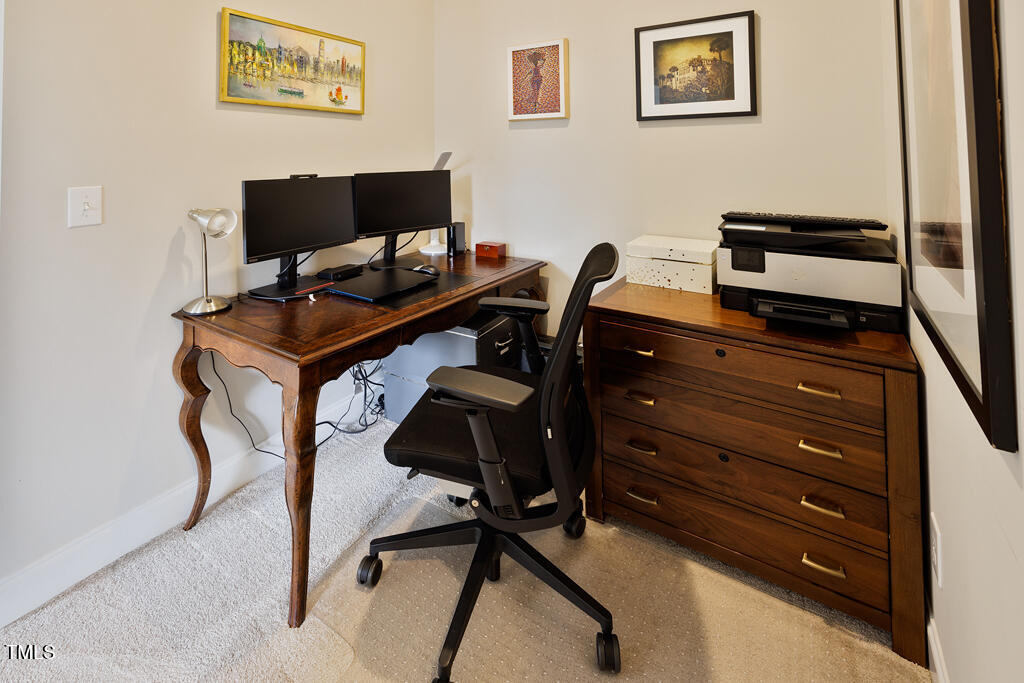 910 Wake Towne Drive Raleigh, NC 27609 - Photo 26 of 45 a view of a workspace with furniture