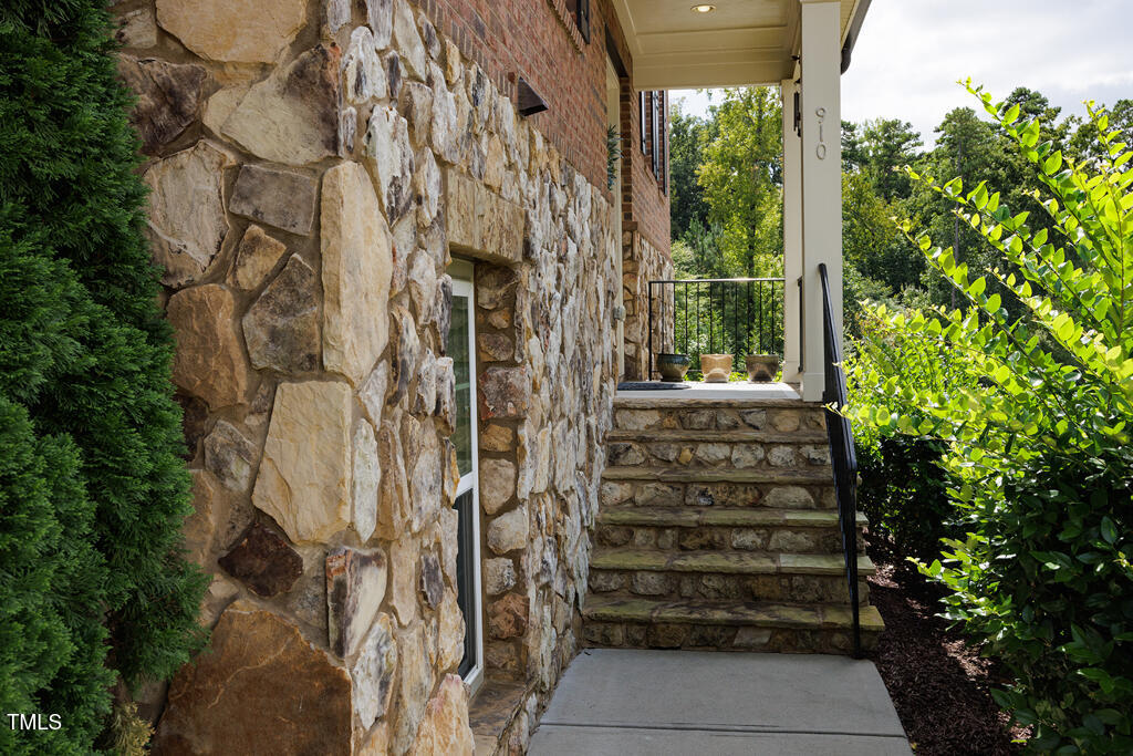 910 Wake Towne Drive Raleigh, NC 27609 - Photo 37 of 45 a view of a pathway of a building