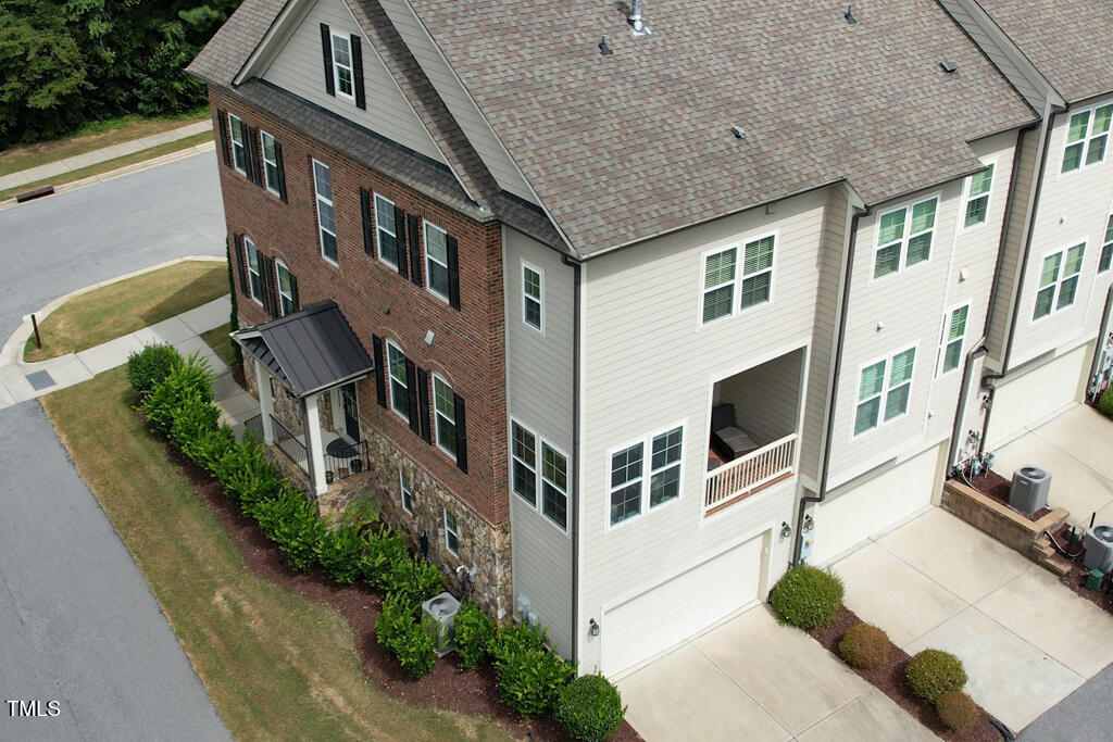 910 Wake Towne Drive Raleigh, NC 27609 - Photo 41 of 45 a view of a large white building with many windows