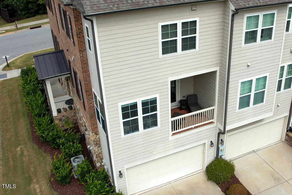 910 Wake Towne Drive Raleigh, NC 27609 - Photo 42 of 45 a front view of a house with a yard