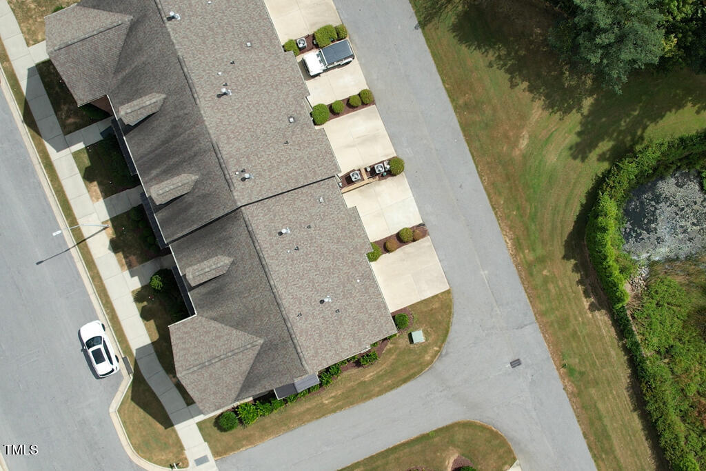 910 Wake Towne Drive Raleigh, NC 27609 - Photo 44 of 45 an aerial view of a house with swimming pool