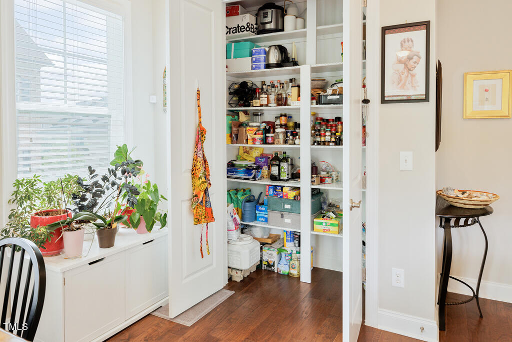 910 Wake Towne Drive Raleigh, NC 27609 - Photo 10 of 45 a room with lots of flowers