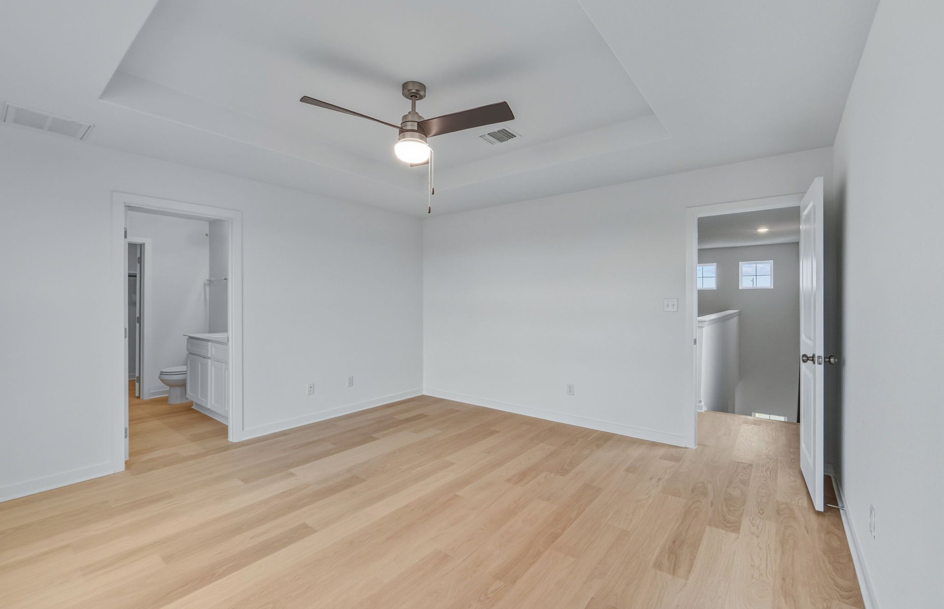 341 Sullivan Way Elgin, TX 78621 - Photo 10 of 23 a view of empty room with wooden floor