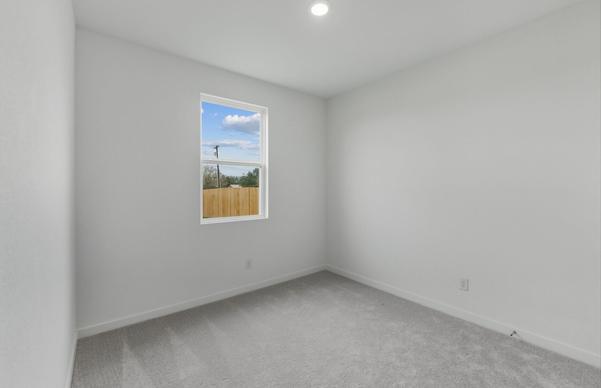 341 Sullivan Way Elgin, TX 78621 - Photo 15 of 23 a view of an empty room with a window