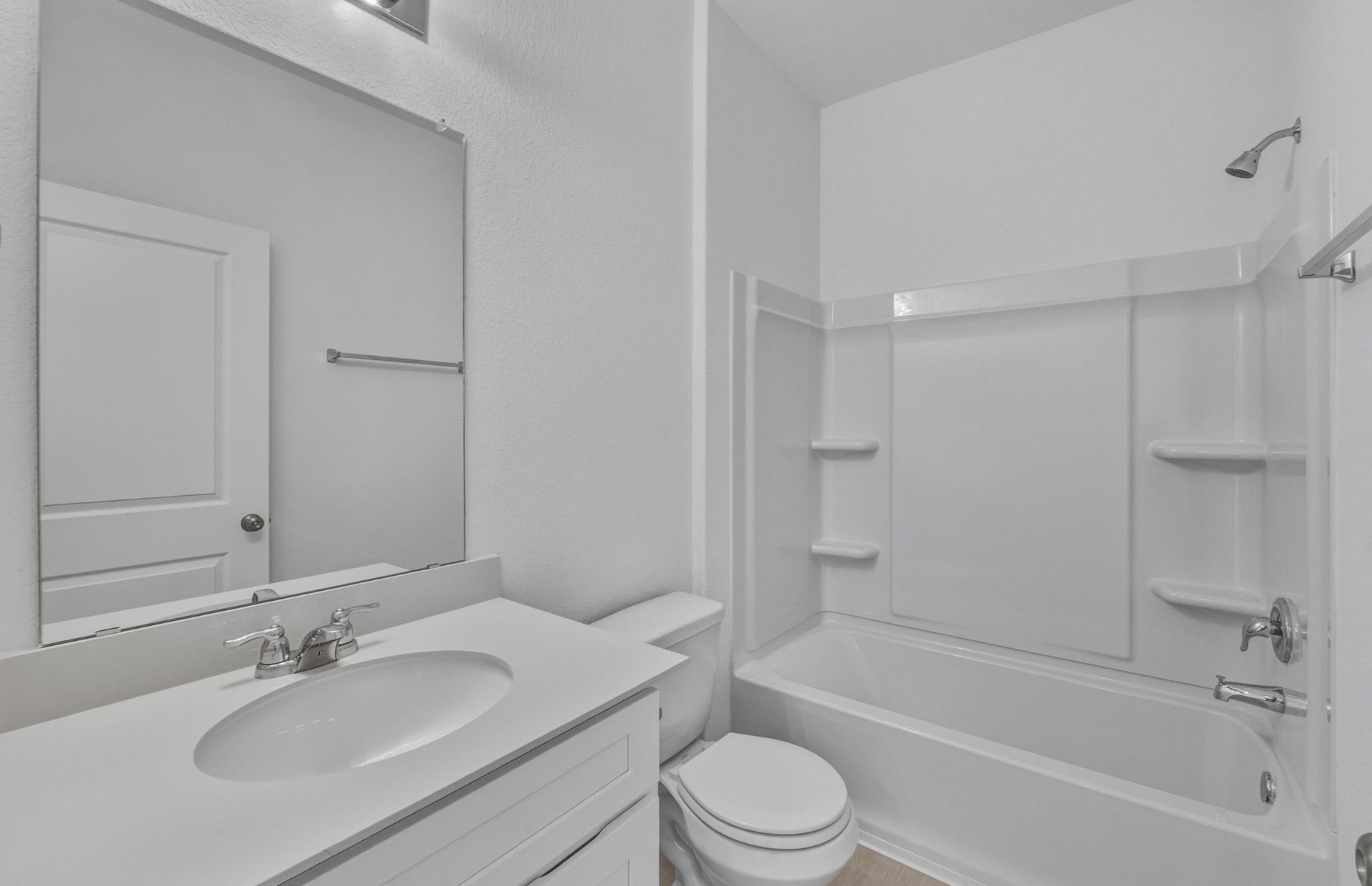 341 Sullivan Way Elgin, TX 78621 - Photo 16 of 23 a bathroom with a granite countertop sink toilet and shower