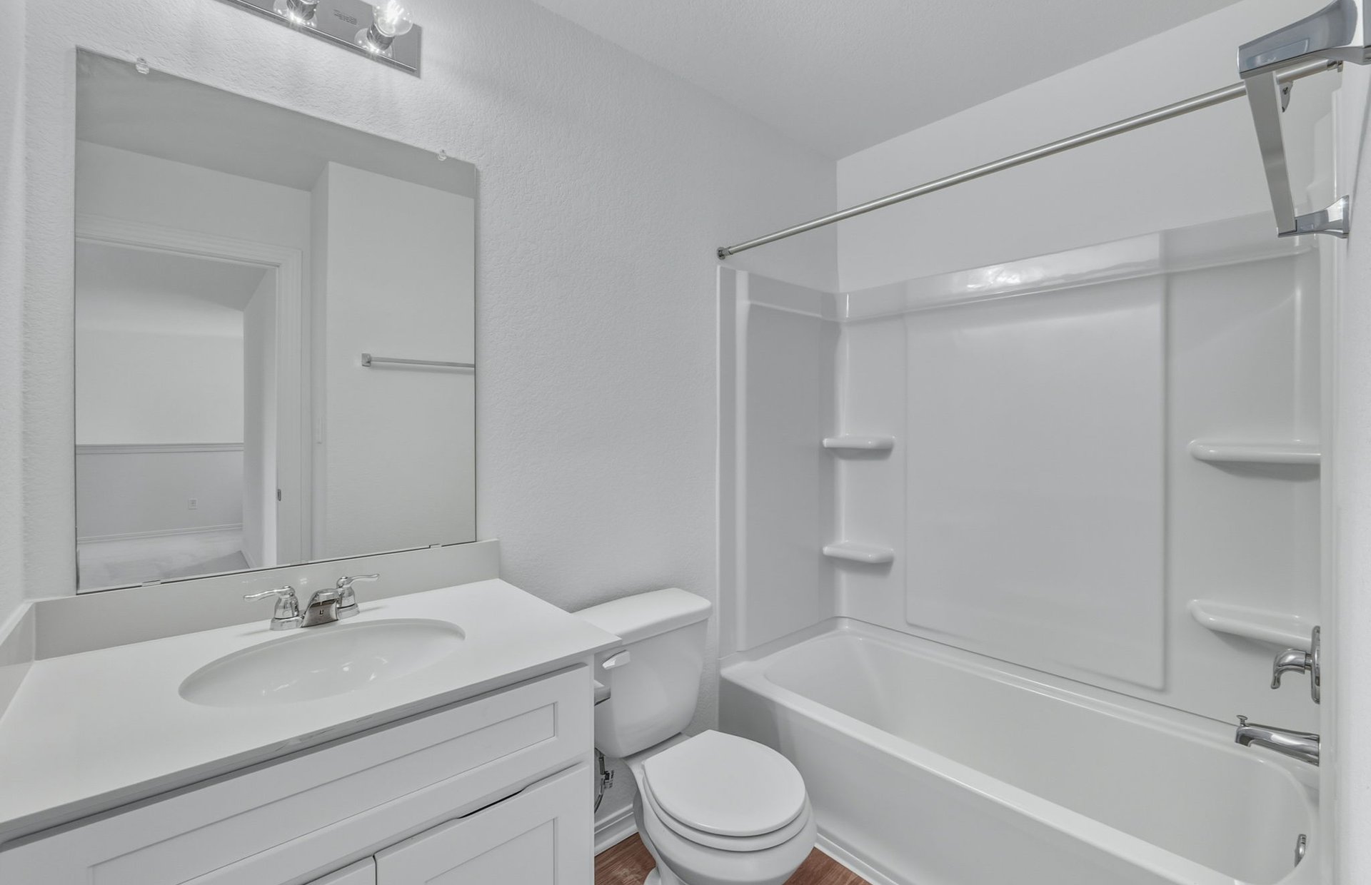 341 Sullivan Way Elgin, TX 78621 - Photo 19 of 23 a bathroom with a sink toilet and a bathtub