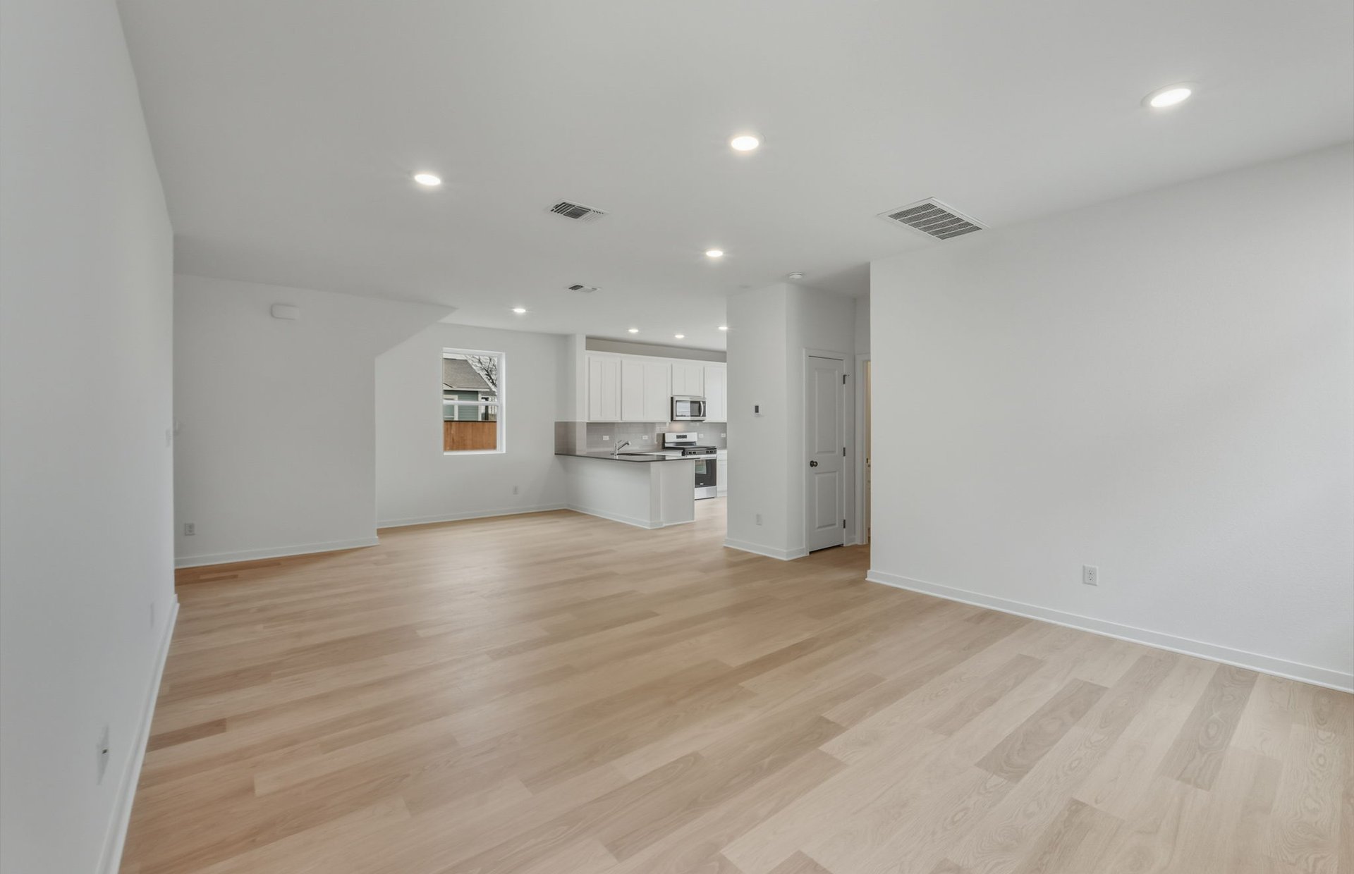 341 Sullivan Way Elgin, TX 78621 - Photo 5 of 23 a view of an empty room with a window
