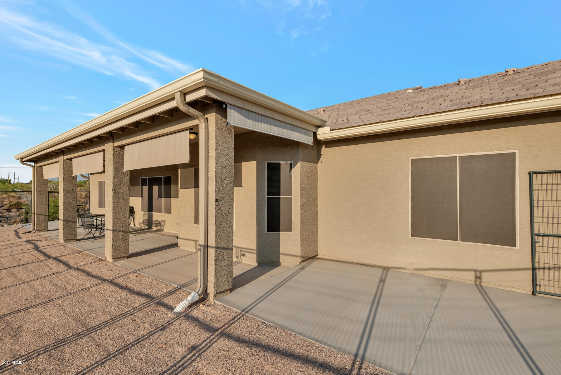 2532 North Val Vista Road Apache Junction, AZ 85119 - Photo 25 of 48 Back patio has fenced area for pets